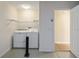 Conveniently-located laundry room at 870 Danforth Ct, The Villages, FL 32162