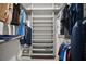 Walk in closet with ample storage space and shelving for organization at 879 Lucky Ln, The Villages, FL 32162