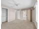 Spacious bedroom with neutral carpet, ample closet space and a ceiling fan at 1061 Soledad Way, The Villages, FL 32159
