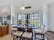 Cozy breakfast nook with large windows offering a view of the outdoors at 11702 Se 173Rd Lane Rd, Summerfield, FL 34491