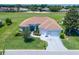 Charming home with a well-maintained lawn, landscaping and a view of the golf course at 11702 Se 173Rd Lane Rd, Summerfield, FL 34491
