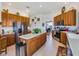 Bright kitchen with stainless steel appliances, white countertops, and ample cabinetry at 11702 Se 173Rd Lane Rd, Summerfield, FL 34491