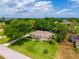 Aerial view showcasing the property's proximity to a stunning blue lake at 11811 Ridge View Cir, Clermont, FL 34711