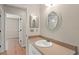 Bathroom featuring a single vanity and mirror at 11811 Ridge View Cir, Clermont, FL 34711
