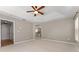 Bedroom with ceiling fan, neutral colors, and carpet at 11811 Ridge View Cir, Clermont, FL 34711
