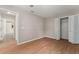 Spacious bedroom featuring wood floors and closet at 11811 Ridge View Cir, Clermont, FL 34711