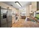 Spacious kitchen with stainless steel appliances, including a large refrigerator at 1203 Zapata Pl, The Villages, FL 32159