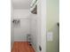 Walk-in closet with ample storage space and wooden floors, great for organization at 1203 Zapata Pl, The Villages, FL 32159