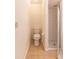 A functional bathroom includes a toilet and a glass-enclosed shower with tiled walls at 12196 Ne 4Th Pl, Oxford, FL 34484
