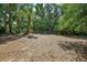 Fenced backyard with mature trees at 1254 Magnolia Farms Ct, Eustis, FL 32726