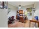 Spacious home office with built-in shelving and a large window at 1254 Magnolia Farms Ct, Eustis, FL 32726