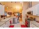 Bright eat-in kitchen features granite countertops and stainless steel appliances at 12846 Brown Bark Trl, Clermont, FL 34711