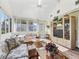 Bright living room featuring lots of natural light and comfortable seating at 1501 Lavaca Ln, The Villages, FL 32159