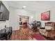 Office featuring a desk, comfortable chair, and view into another seating area at 1501 Lavaca Ln, The Villages, FL 32159