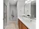 Bathroom featuring vessel sink and wood cabinets at 1502 Blueberry Way, The Villages, FL 32162