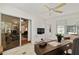 Bright office space with access to the living room with sliding glass doors at 1502 Blueberry Way, The Villages, FL 32162