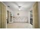 Versatile bonus room with custom cabinetry, carpet flooring, and natural light at 1512 S Pointe Dr, Leesburg, FL 34748