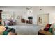 Bright living area with ceiling fan, adjoining dining area and lots of space at 1512 S Pointe Dr, Leesburg, FL 34748