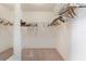 Walk-in closet with ample storage space and shelving at 1513 Lozano Ave, The Villages, FL 32159
