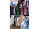 Walk-in closet with rods and shelves for optimal storage and organization at 15501 Markham Dr, Clermont, FL 34714