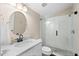 Bathroom featuring modern fixtures, a glass-enclosed shower, and stylish vanity at 2029 Stefano Ct, Mount Dora, FL 32757