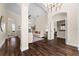 Spacious living room with hardwood floors, archways, high ceilings and natural light at 2029 Stefano Ct, Mount Dora, FL 32757