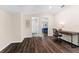 Modern home office featuring a sleek desk and chair, with an ensuite bathroom at 2029 Stefano Ct, Mount Dora, FL 32757