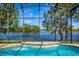 Screened pool and spa offer beautiful lake view at 2029 Stefano Ct, Mount Dora, FL 32757