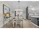 The dining room provides access to the living room and kitchen for ease of entertaining guests and Gathering at 2170 Biller Cir, The Villages, FL 32163