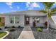 Inviting front entrance with a well-maintained walkway and landscaping at 2170 Biller Cir, The Villages, FL 32163