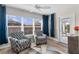 A well-lit sunroom features neutral paint, tile floors, and oversized windows, perfect for relaxing with a view at 2170 Biller Cir, The Villages, FL 32163