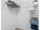 Bright walk-in closet with wire shelving providing ample storage space at 2170 Biller Cir, The Villages, FL 32163