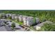 Beautiful aerial view of a multi-Gathering property with mature landscaping, in a wooded area at 2310 Silver Palm Dr # 301, Kissimmee, FL 34747