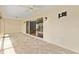 Enclosed lanai with brick flooring, ceiling fans, and sliding glass doors to the interior at 278 Matisse Ave, The Villages, FL 32162
