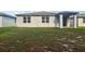 New home with backyard space for endless activity at 28078 Poppy Ct, Leesburg, FL 34748