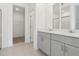 Bathroom with double sink vanity and tile floors at 28078 Poppy Ct, Leesburg, FL 34748