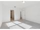 Sunlit bedroom featuring neutral carpet and recessed ceiling light at 28078 Poppy Ct, Leesburg, FL 34748