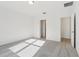 Bright bedroom with neutral carpet and recessed ceiling light at 28078 Poppy Ct, Leesburg, FL 34748