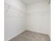 Walk-in closet offers ample storage space with wire shelving installed at 28078 Poppy Ct, Leesburg, FL 34748