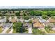 Aerial view featuring the home's position in a beautiful, manicured neighborhood at 299 Jefferson Ln, The Villages, FL 32162
