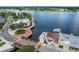 Beautiful aerial view featuring waterfront dining on docks with scenic lake views, offering a relaxing and inviting ambiance at 299 Jefferson Ln, The Villages, FL 32162
