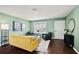 Bright living room featuring hardwood floors, neutral decor, and lots of natural light at 299 Jefferson Ln, The Villages, FL 32162
