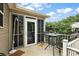 Relaxing screened patio with outdoor shower and table, perfect for enjoying the outdoors at 299 Jefferson Ln, The Villages, FL 32162