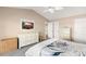 Bright bedroom with vaulted ceiling, white dresser, and cozy decor for a relaxing retreat at 3011 Lake Woodward Dr, Eustis, FL 32726