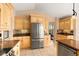 Bright and cozy kitchen with great light, lots of storage, and stainless appliances at 3011 Lake Woodward Dr, Eustis, FL 32726