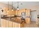 Bright kitchen with stainless appliances, ample cabinetry, and modern countertops at 3011 Lake Woodward Dr, Eustis, FL 32726