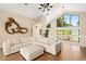 Comfortable and spacious living room with great natural light and cozy furniture at 3011 Lake Woodward Dr, Eustis, FL 32726