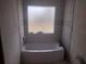 Unfinished bathroom features new soaking tub at 3051 Newmark Dr, Deltona, FL 32738