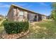A private backyard with a screened porch, ideal for enjoying the outdoors with a nice yard at 3654 Limestone St, Clermont, FL 34711