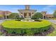 Community center with a decorative water fountain in a lush green landscape and a welcoming facade at 3654 Limestone St, Clermont, FL 34711